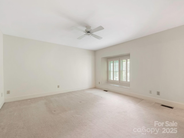 232 Perrin Pl, Charlotte, NC 28207 - empty room featuring ceiling fan, carpet, and baseboards