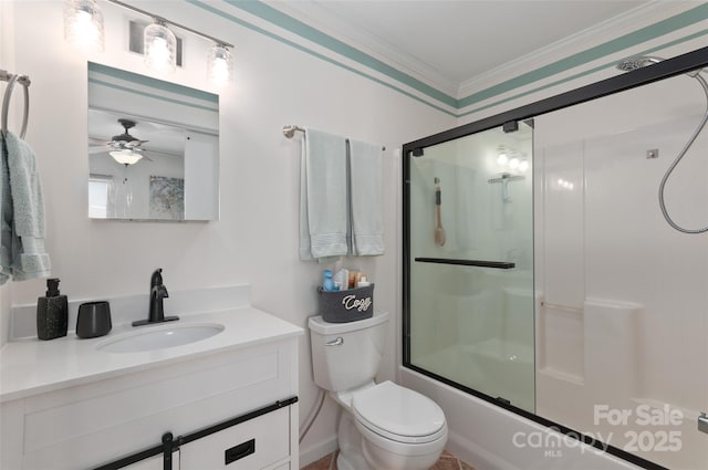 full bath with ceiling fan, vanity, combined bath / shower with glass door, toilet, and ornamental molding