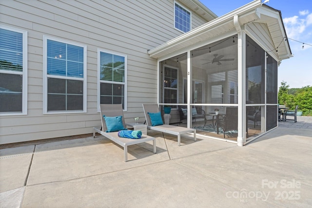 view of patio / terrace with a sunroom and area for grilling