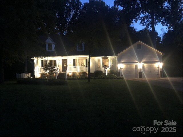 709 Weldon Ln, Salisbury, NC 28146 - cape cod home with a porch, a garage, and driveway