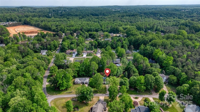 709 Weldon Ln, Salisbury, NC 28146 - drone / aerial view with a wooded view
