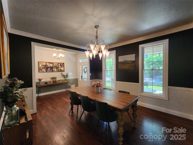 521 Hobson Rd, Bakersville, NC 28705 - dining room with a chandelier, dark wood finished floors, crown molding, and baseboards