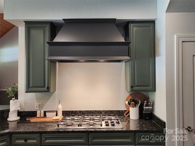 521 Hobson Rd, Bakersville, NC 28705 - kitchen featuring custom range hood, stainless steel gas stovetop, and dark stone counters