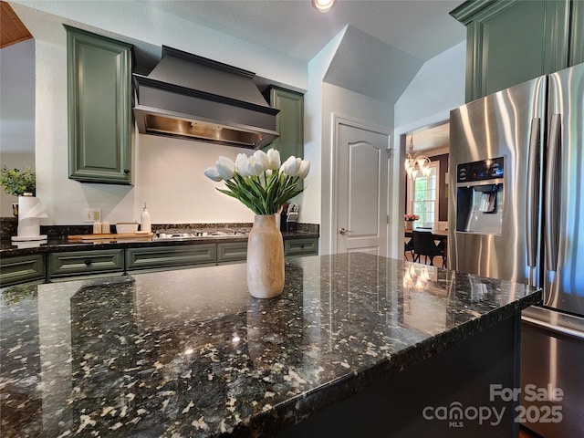 521 Hobson Rd, Bakersville, NC 28705 - kitchen featuring stainless steel appliances, green cabinets, custom exhaust hood, a chandelier, and vaulted ceiling