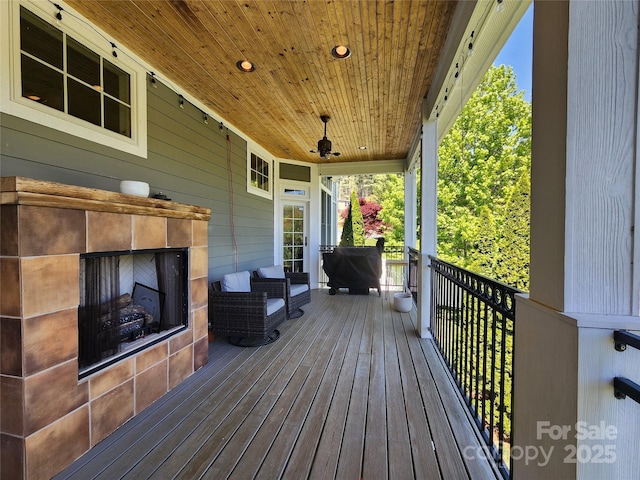 521 Hobson Rd, Bakersville, NC 28705 - wooden porch with a fireplace