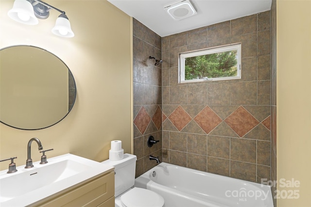bathroom with vanity, toilet, visible vents, and bathtub / shower combination