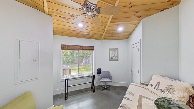 16 Caddis Ct, Marshall, NC 28753 - living area featuring wooden ceiling, a ceiling fan, baseboards, electric panel, and concrete flooring