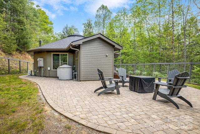 16 Caddis Ct, Marshall, NC 28753 - view of patio / terrace with an outdoor fire pit and fence
