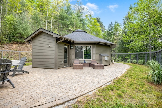 16 Caddis Ct, Marshall, NC 28753 - back of house featuring outdoor lounge area, a patio, and a fenced backyard