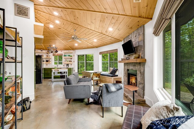 16 Caddis Ct, Marshall, NC 28753 - living room with wood ceiling, a fireplace, finished concrete floors, baseboards, and recessed lighting