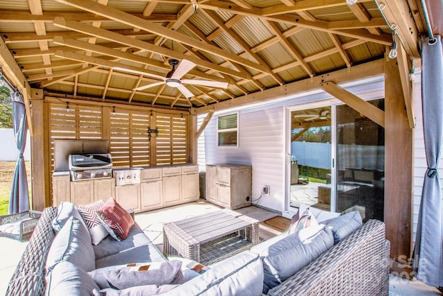 view of patio featuring ceiling fan, grilling area, area for grilling, an outdoor living space, and a gazebo