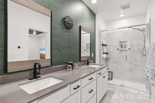 104 Trellis Ln, Troutman, NC 28166 - full bath with marble look tiles, a shower stall, double vanity, and recessed lighting
