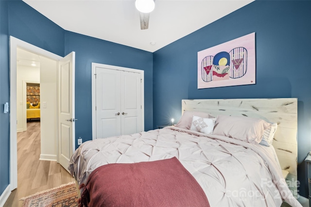 104 Trellis Ln, Troutman, NC 28166 - bedroom featuring wood finished floors, a closet, and baseboards
