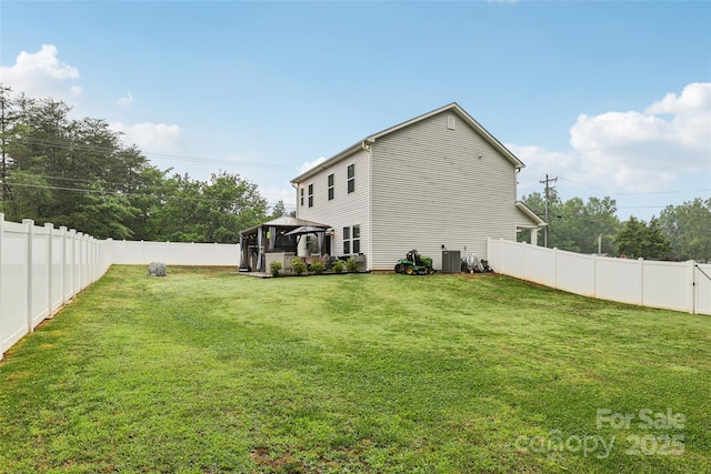 104 Trellis Ln, Troutman, NC 28166 - back of house with a gazebo and central AC unit