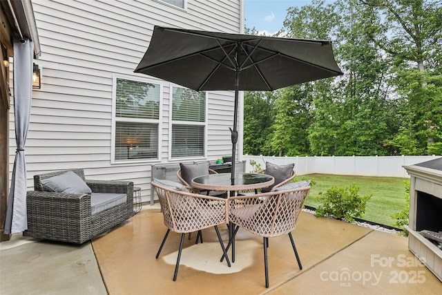 104 Trellis Ln, Troutman, NC 28166 - view of patio / terrace featuring outdoor dining area