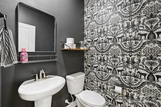 104 Trellis Ln, Troutman, NC 28166 - half bathroom featuring toilet and a sink