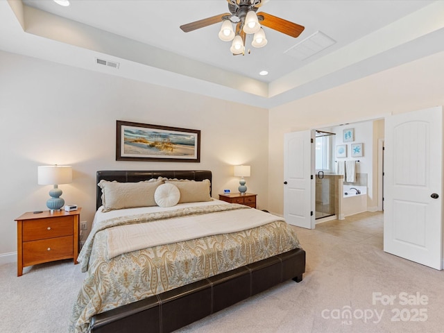 bedroom featuring baseboards, recessed lighting, light carpet, and visible vents