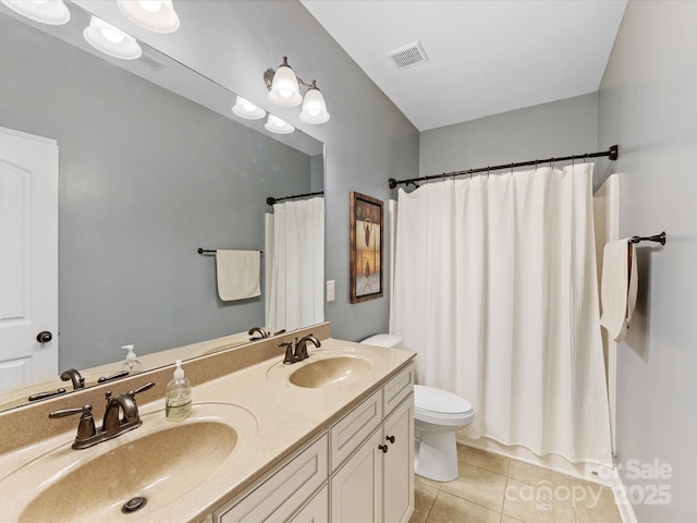 full bath featuring tile patterned floors, toilet, visible vents, and a sink