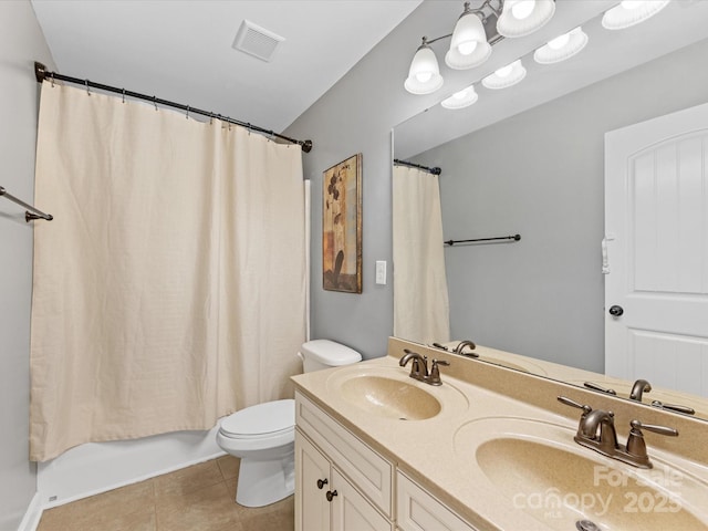 full bathroom with a sink, toilet, visible vents, and tile patterned floors