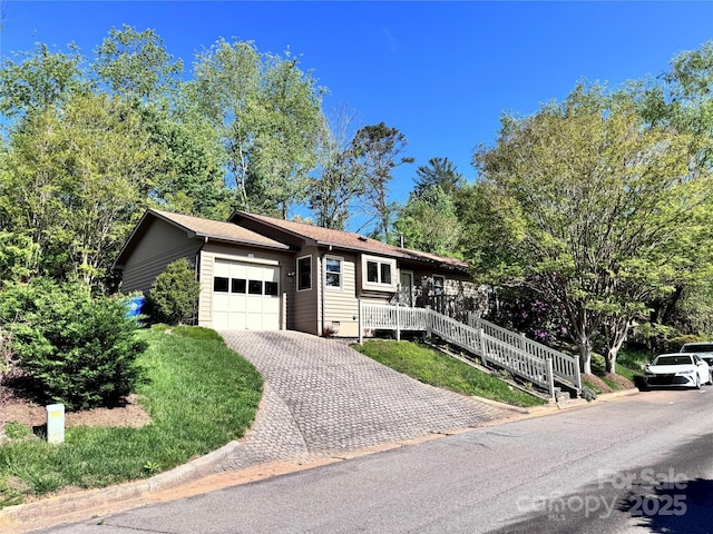 5A Hedgerose Ct, Asheville, NC 28805 - ranch-style house with an attached garage and driveway