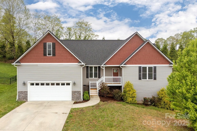76 Tryon View Dr, Flat Rock, NC 28731 - craftsman-style home with a garage, stone siding, driveway, and a front yard