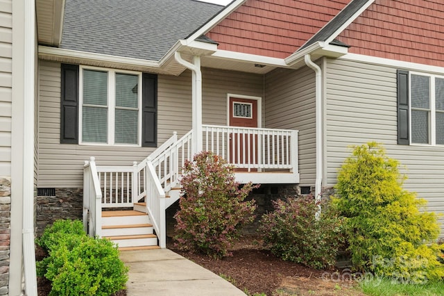 76 Tryon View Dr, Flat Rock, NC 28731 - property entrance featuring a porch, roof with shingles, and crawl space