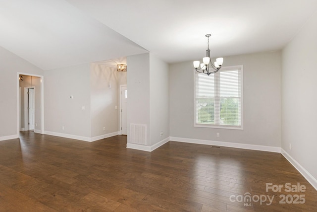 76 Tryon View Dr, Flat Rock, NC 28731 - unfurnished room with dark wood-style flooring, visible vents, vaulted ceiling, baseboards, and a chandelier