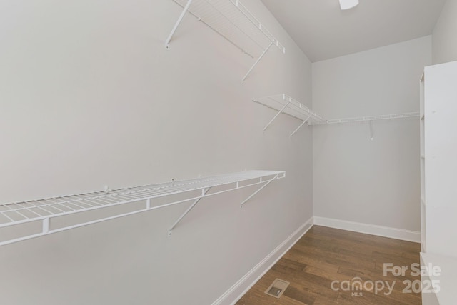 76 Tryon View Dr, Flat Rock, NC 28731 - spacious closet featuring visible vents and wood finished floors