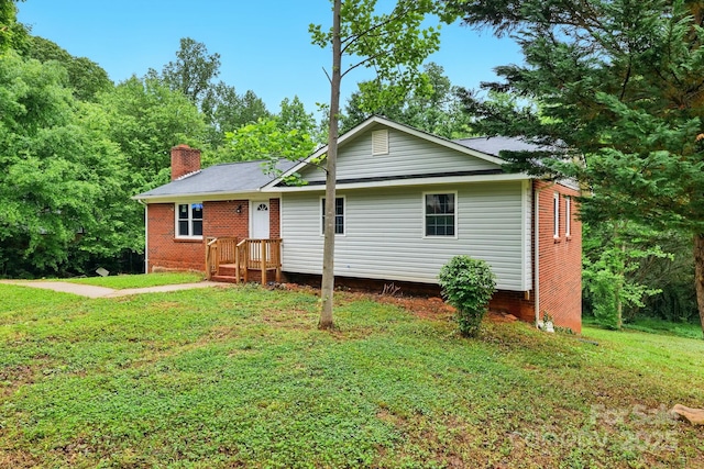 131 Little Forest Ln, Statesville, NC 28625 - ranch-style home featuring a chimney and a front yard