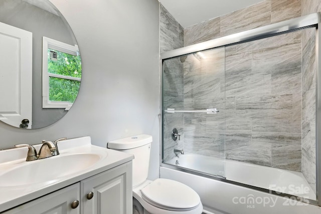 131 Little Forest Ln, Statesville, NC 28625 - bathroom featuring vanity, enclosed tub / shower combo, and toilet