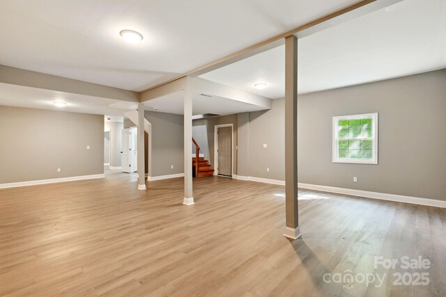 131 Little Forest Ln, Statesville, NC 28625 - basement with baseboards, stairway, and light wood-style floors