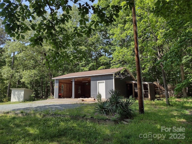 1820 Trinity Church Rd, Monroe, NC 28112 - garage with a storage shed