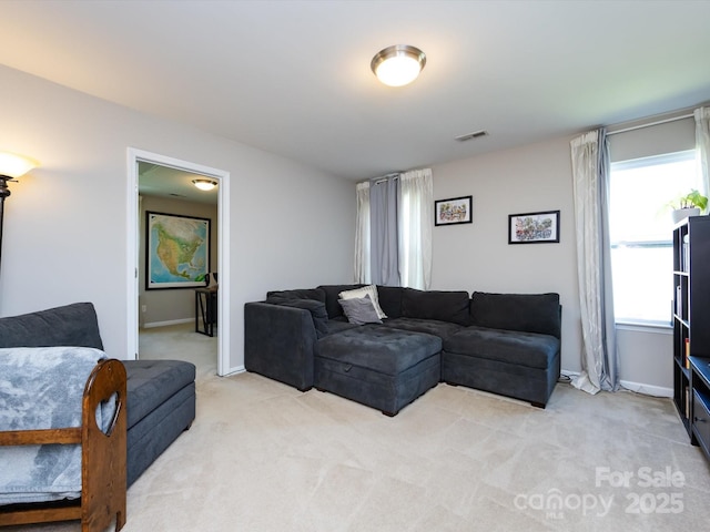 4012 Martele Dr, Mint Hill, NC 28227 - living area featuring visible vents, baseboards, and light carpet
