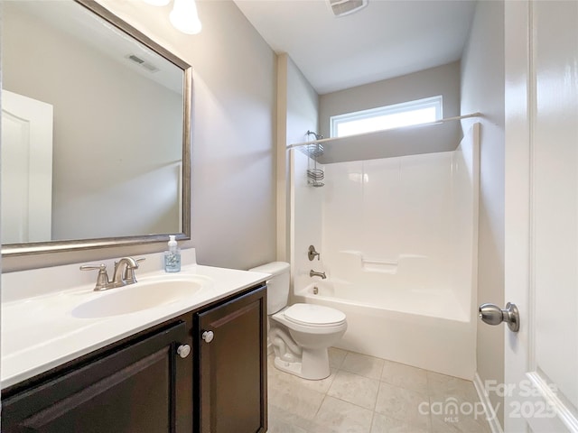 full bathroom featuring visible vents, vanity, tub / shower combination, toilet, and tile patterned floors