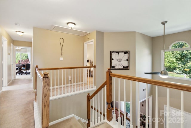 7700 Ninth Fairway Ln, Mint Hill, NC 28227 - corridor featuring carpet floors, attic access, baseboards, and an upstairs landing
