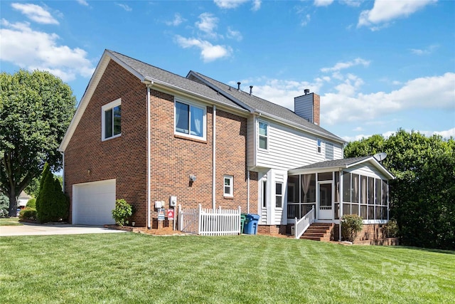 7700 Ninth Fairway Ln, Mint Hill, NC 28227 - back of property featuring a garage, a chimney, a sunroom, concrete driveway, and a lawn