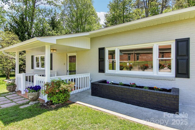 view of front of property with brick siding