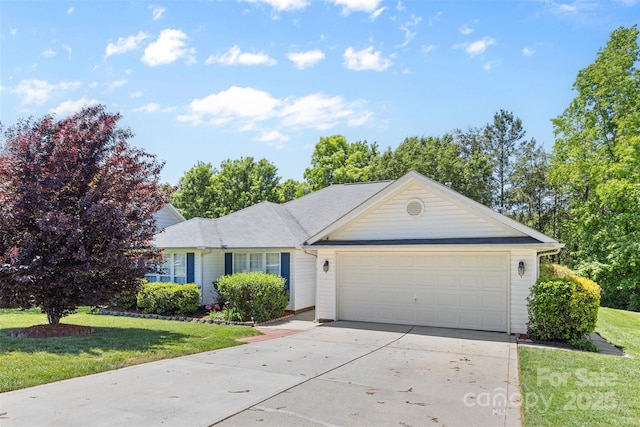 ranch-style home featuring concrete driveway, an attached garage, and a front lawn