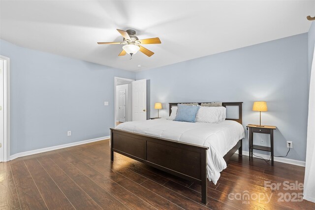 bedroom with baseboards, a ceiling fan, and wood finished floors