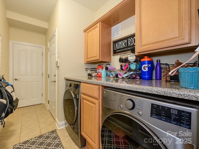 10944 Persimmon Creek Dr, Mint Hill, NC 28227 - clothes washing area featuring visible vents, washer and clothes dryer, cabinet space, and light tile patterned floors