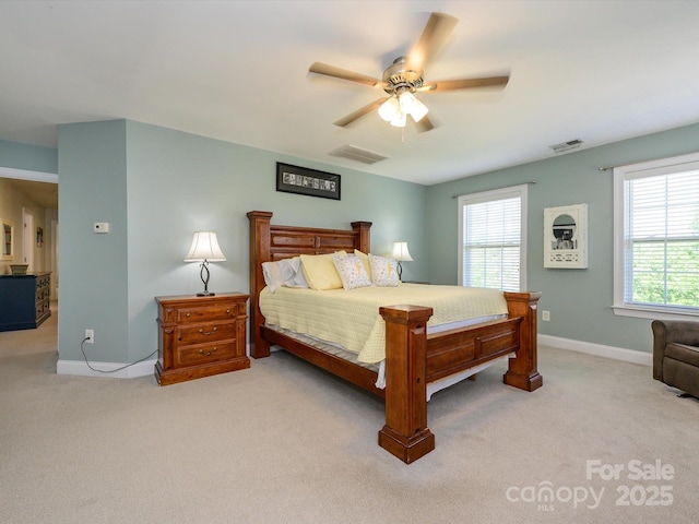 10944 Persimmon Creek Dr, Mint Hill, NC 28227 - bedroom with visible vents, baseboards, ceiling fan, and light colored carpet