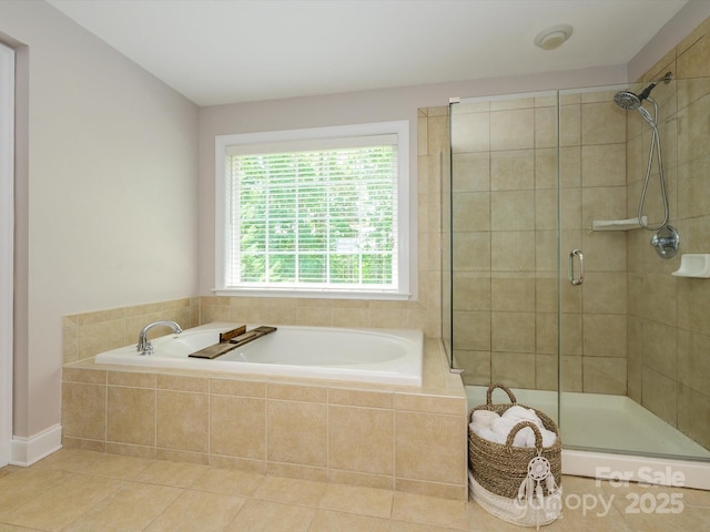 10944 Persimmon Creek Dr, Mint Hill, NC 28227 - bathroom featuring tile patterned flooring, a shower stall, and a garden tub