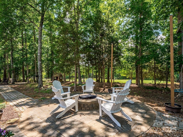 10944 Persimmon Creek Dr, Mint Hill, NC 28227 - view of patio / terrace featuring a fire pit