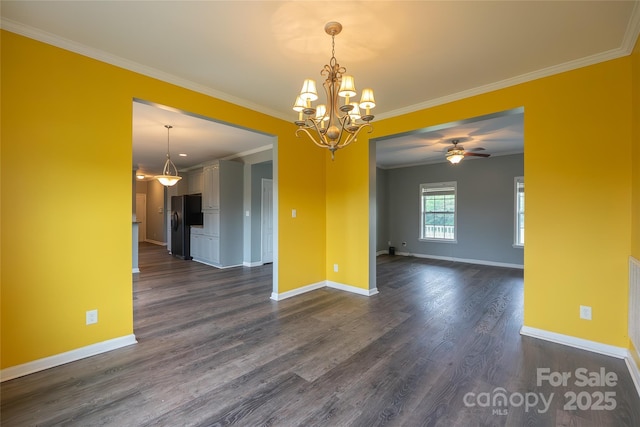 unfurnished room featuring a chandelier, baseboards, ornamental molding, dark wood-style floors, and a ceiling fan