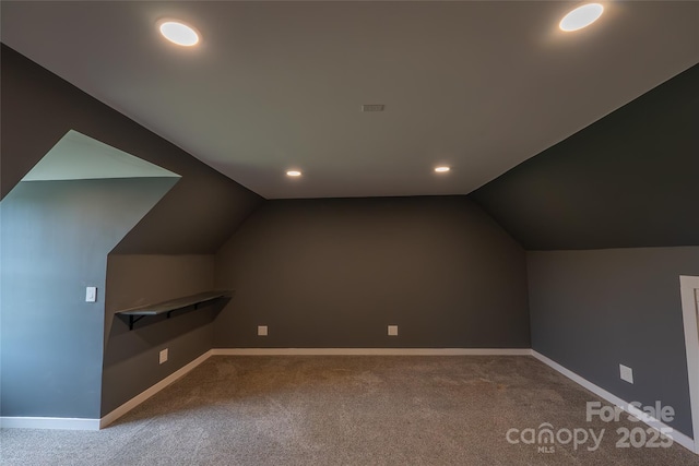bonus room featuring carpet floors, recessed lighting, baseboards, and vaulted ceiling