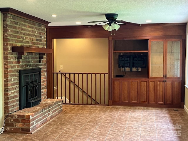 unfurnished living room with tile patterned flooring, ceiling fan, recessed lighting, and a textured ceiling