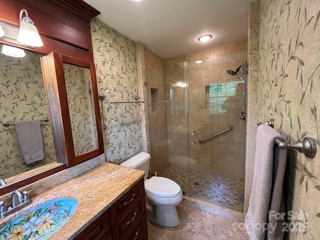 full bathroom with toilet, recessed lighting, a shower stall, and vanity