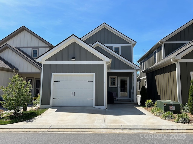 24 Wheeler Rd, Weaverville, NC 28787 - view of front of property with an attached garage, concrete driveway, and board and batten siding