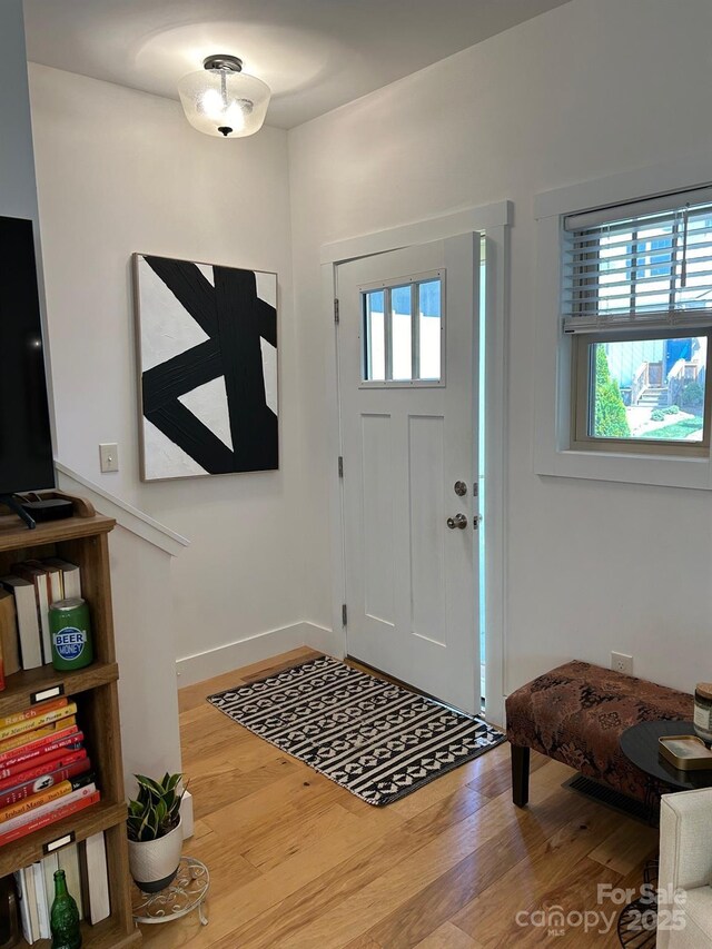 24 Wheeler Rd, Weaverville, NC 28787 - foyer entrance featuring wood finished floors and plenty of natural light