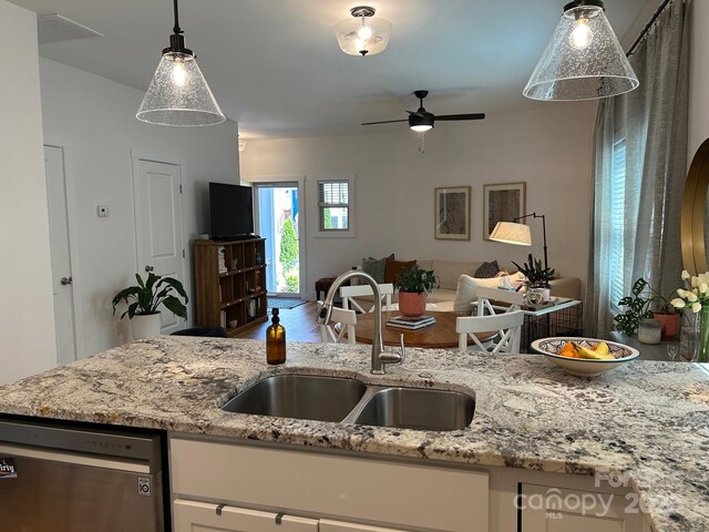 24 Wheeler Rd, Weaverville, NC 28787 - kitchen featuring a sink, stainless steel dishwasher, open floor plan, a ceiling fan, and decorative light fixtures